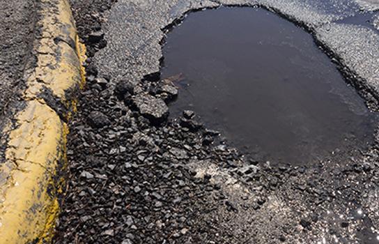 Potholes and Vehicle Damage - Join AAA today for peace of mind when you get a flat tire